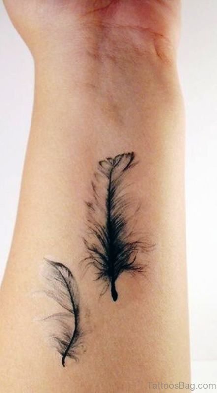 Grey Feathers Tattoo On Wrist