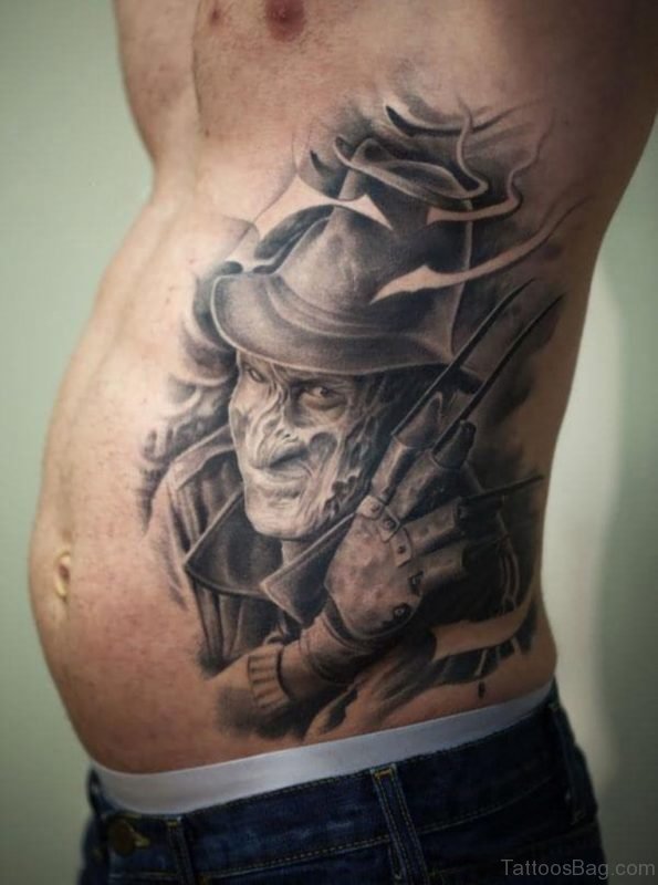 Grey Ink 3D Freddy Krueger Portrait Tattoo On Side Rib