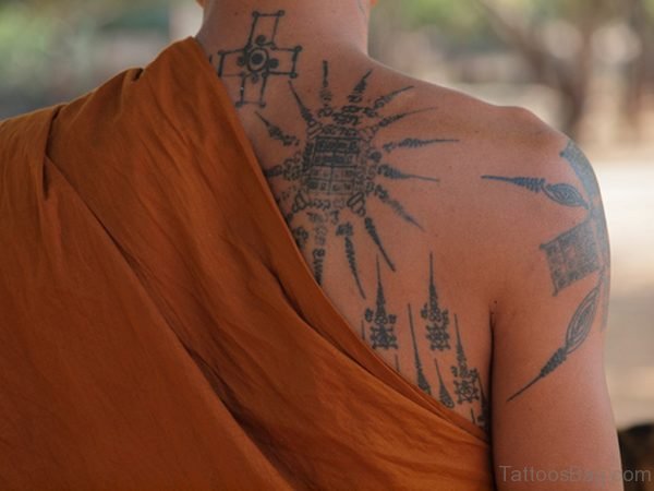 Grey Ink Buddhist Tattoo 