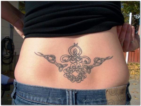 Grey Ink Celtic Tattoo On Lower Back