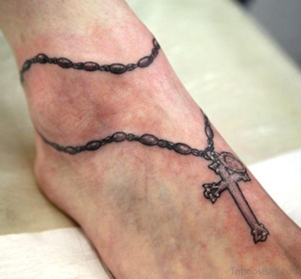 Grey Ink Cross Tattoo