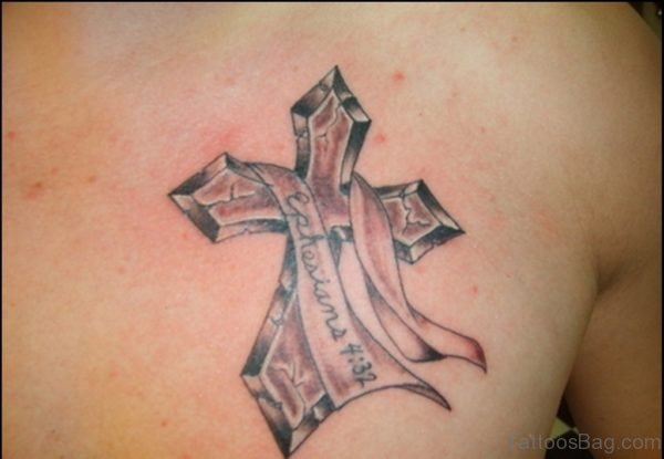 Grey Ink Cross With Banner Tattoo On Man Chest