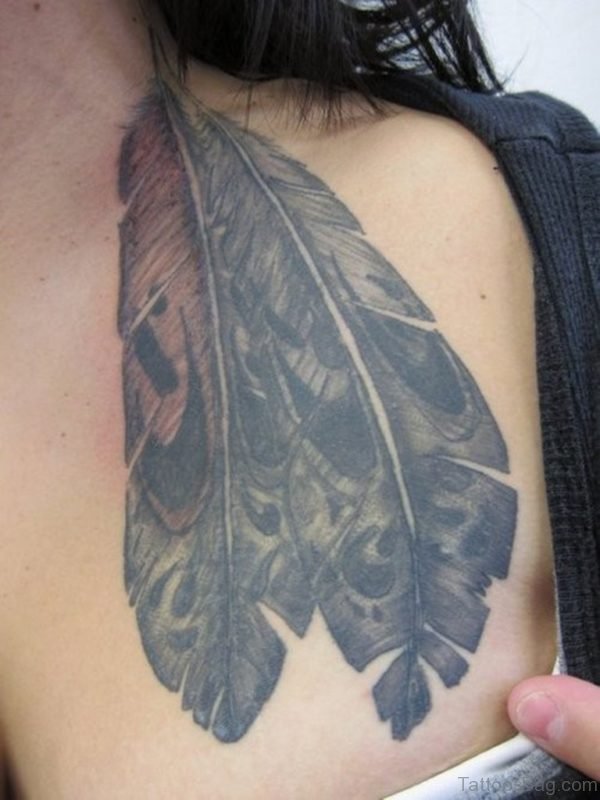 Grey Ink Feather Tattoo
