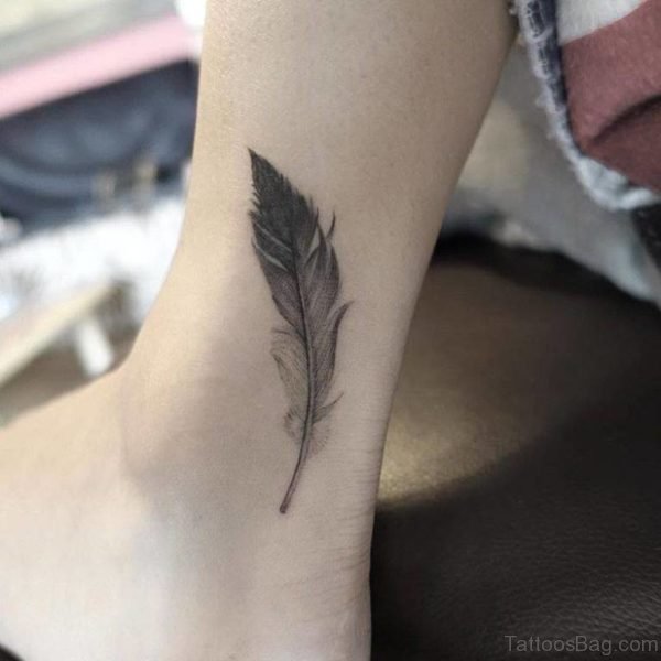 Grey Ink Feather Tattoo Design