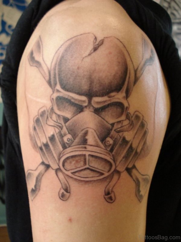 Grey Ink Gas Mask Tattoo On Shoulder