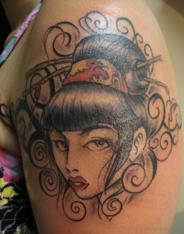 Grey Ink Geisha Head Tattoo On Left Shoulder