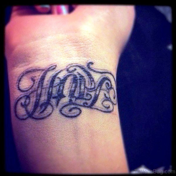 Grey Ink Hope Tattoo On Wrist