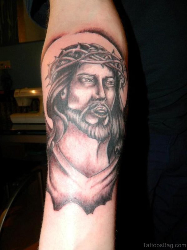 Grey Ink Jesus Face Tattoo On Right Forearm