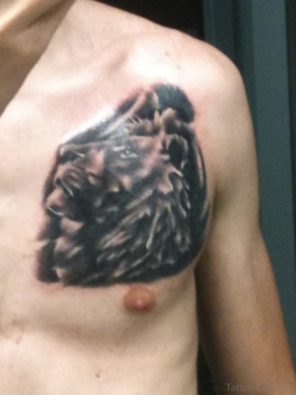 Grey Ink Lion Head Tattoo