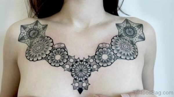 Grey Ink Mandala Tattoo On Girl Chest