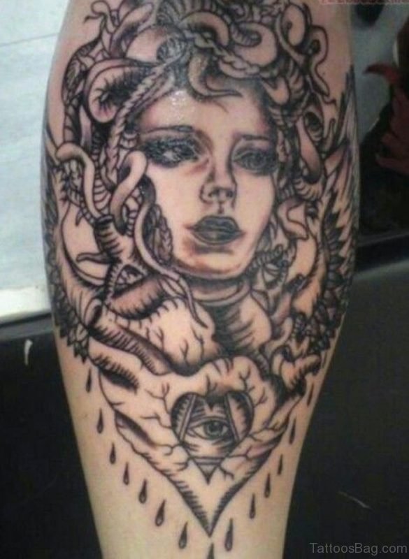 Grey Ink Medusa Tattoo On Back Leg Calf