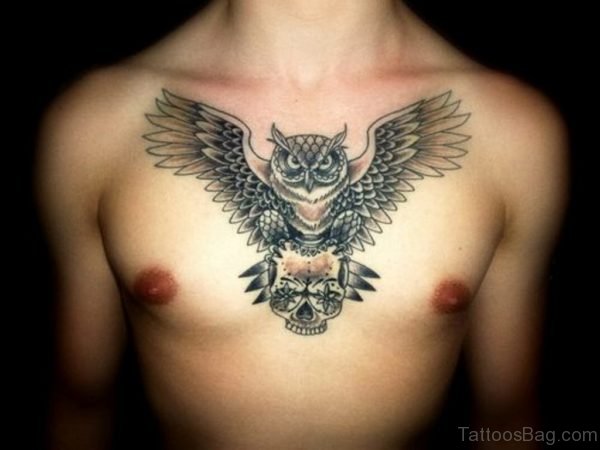 Grey Ink Owl And Sugar Skull Tattoo On Chest