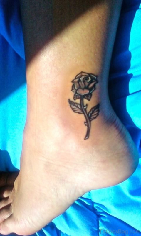 Grey Ink Rose Tattoo On Ankle
