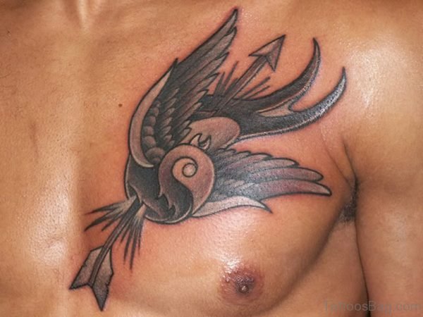 Grey Ink Swallow With Arrow Tattoo On Chest