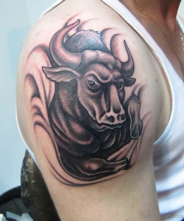 Grey Inked Bull Tattoo On Shoulder