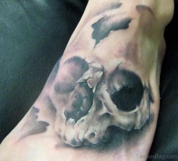 Grey Skull Tattoo On Foot