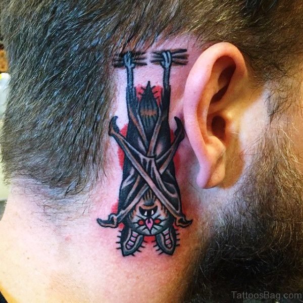 Hanging Bat Tattoo Behind Ears