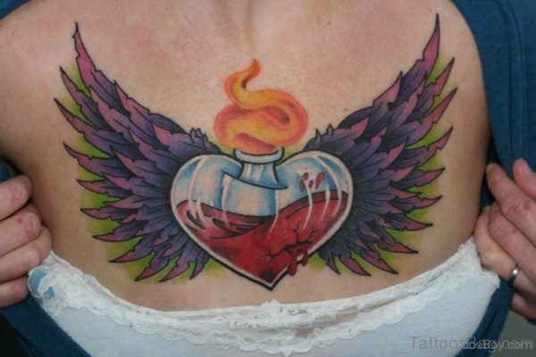 Heart And Wings Tattoo On Chest