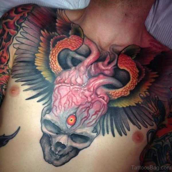 Skull And Wings Tattoo On Chest 
