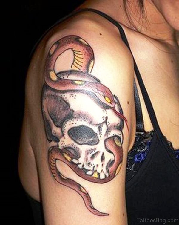 Horrible Skull And Snake Tattoo