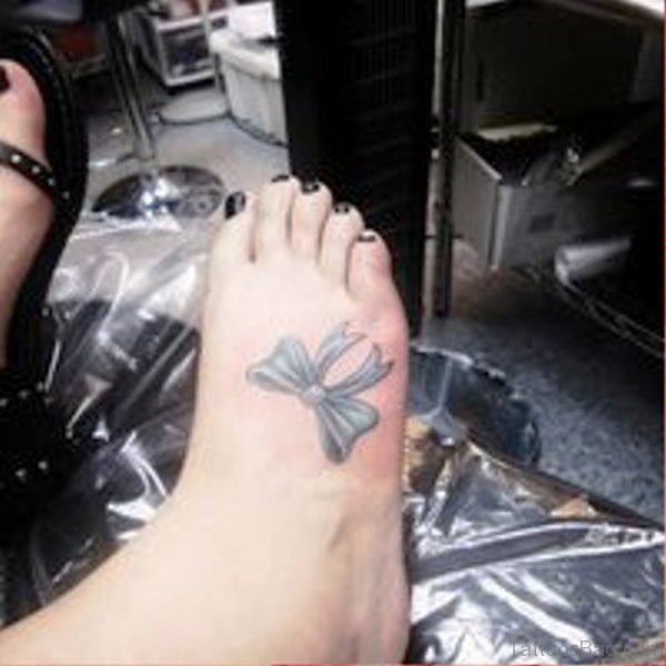 Image Of Bow Tattoo On Foot