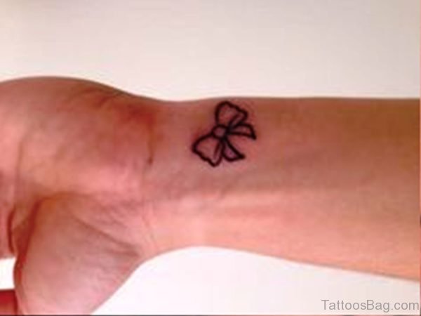 Image Of Bow Tattoo On Wrist