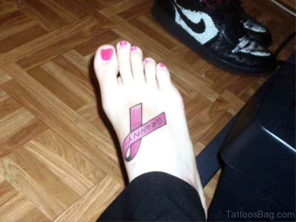 Image Of Cancer Ribbon Tattoo On Foot