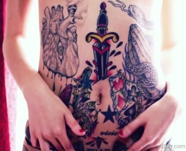 Image Of Dagger Tattoo On Stomach