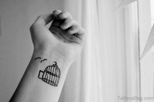 Impressive Birdcage Tattoo On Wrist