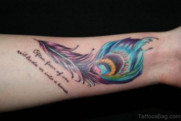 Impressive Peacock Feather Wrist Tattoo