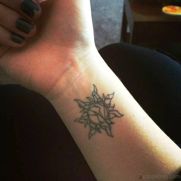 Impressive Sun Tattoo On Wrist