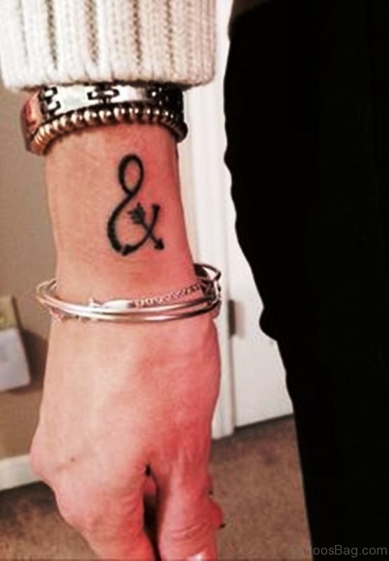 Infinity With Arrow Tattoo On Wrist