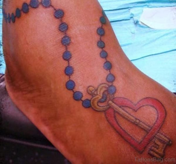 Key And Heart Tattoo On Foot