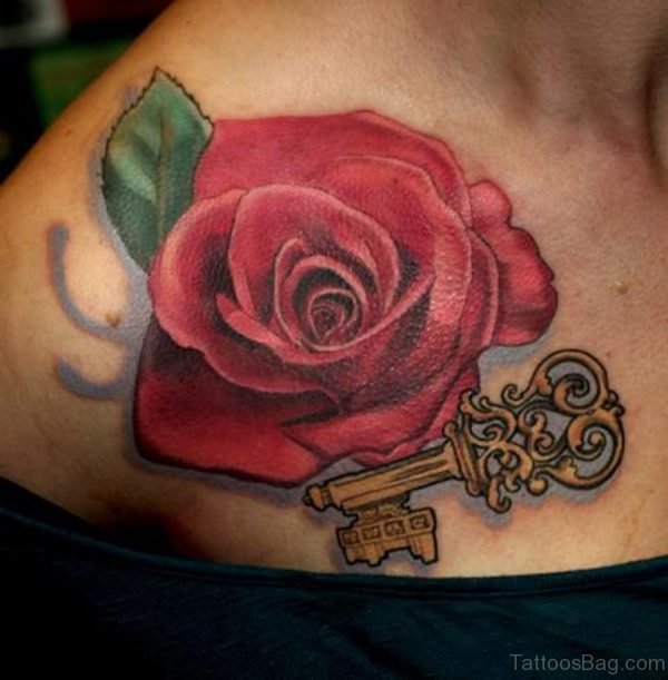 Key And Rose Tattoo On Chest