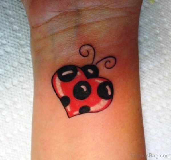 Ladybug Heart Wrist Tattoo 