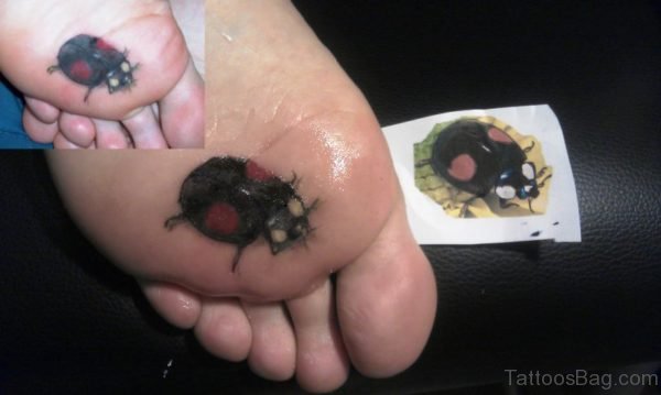 Ladybug Tattoo On Underfoot 