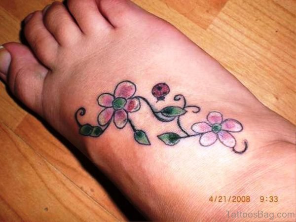 Ladybug With Flowers Tattoo 