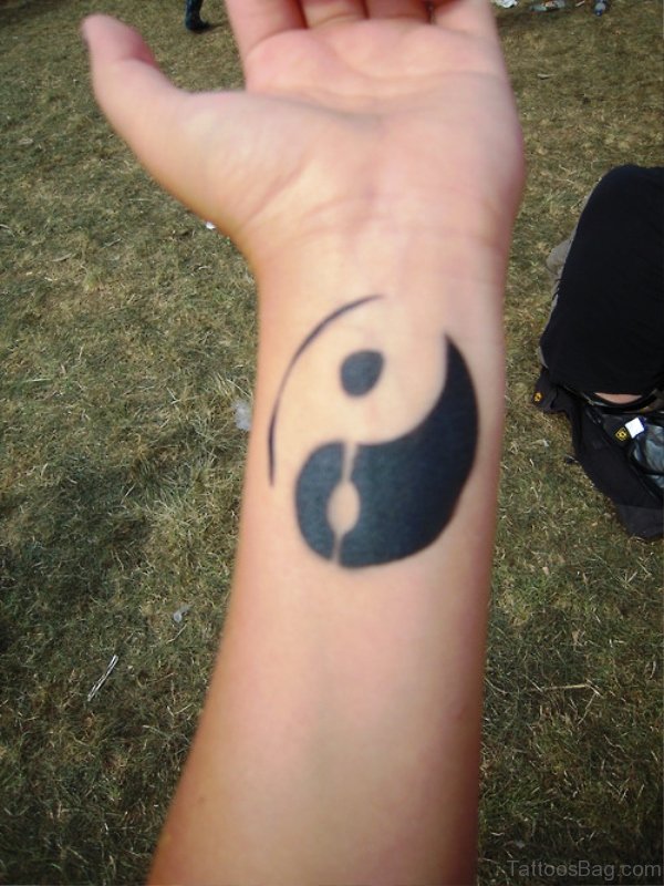 Large Yin Yang Tattoo On Wrist