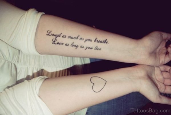 Laugh And Love Quote Tattoo On Wrist