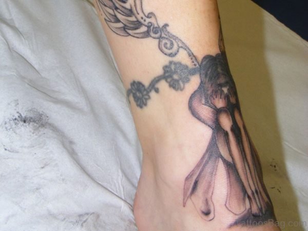 Leggy Fallen Angel Tatoo