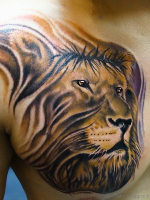 Lion And Tribal Tattoo On Chest