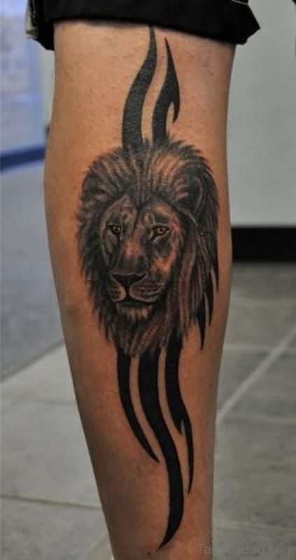 Lion Face And Tribal Tattoo