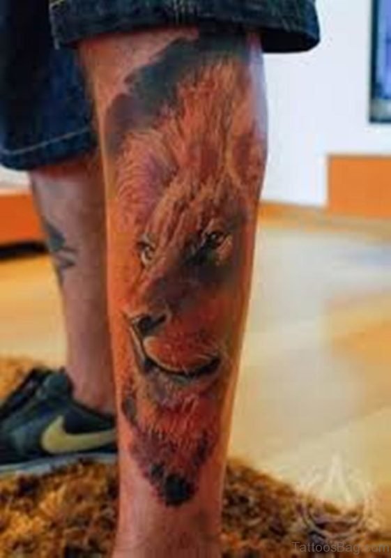 Lion Face Tattoo On Leg