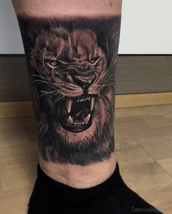 Lion Tattoo On Lower Leg