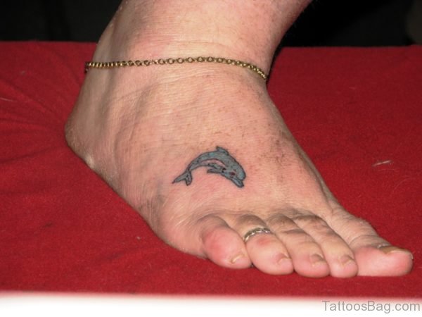 Little Dolphin Tattoo On Foot