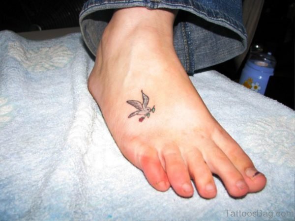 Little Dove Tattoo With Flower