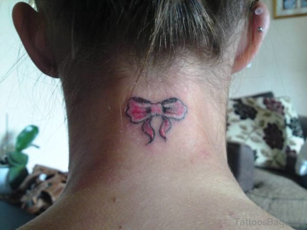 Little Pink Bow Tattoo On Neck