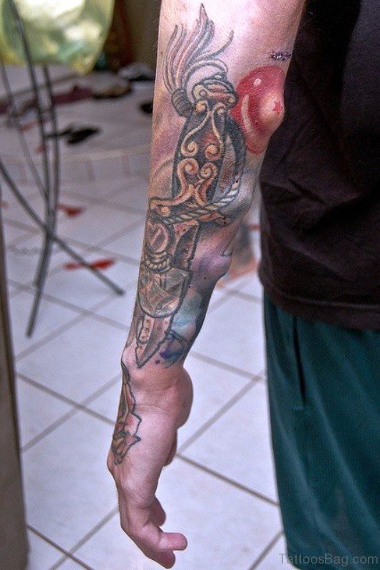 Long Dagger Tattoo On Arm