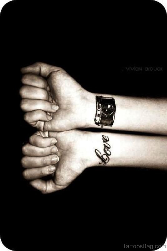 Love Camera Tattoo On Wrist 