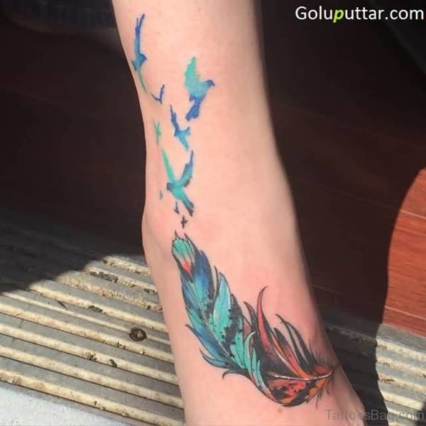 Lovely Animated Feather And Birds Tattoo